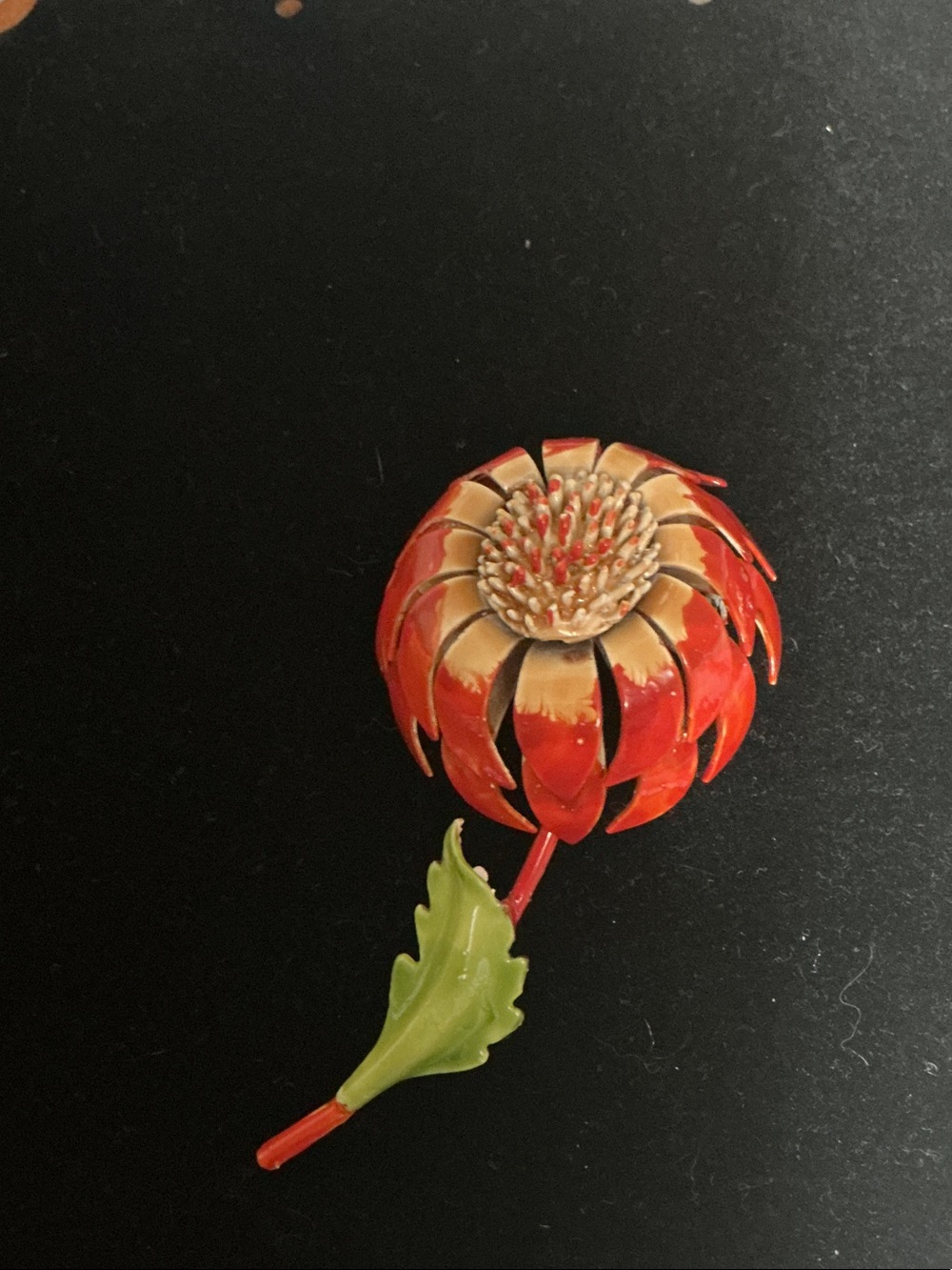 Vintage Orange Enamel Flower Brooch with Green Leaf
